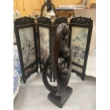 AN ABSTRACT 'MOTHER AND CHILD' SCULPTURE PLUS A SMALL ORIENTAL STYLE SCREEN