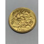 A GEORGE V 1914 GOLD HALF SOVEREIGN