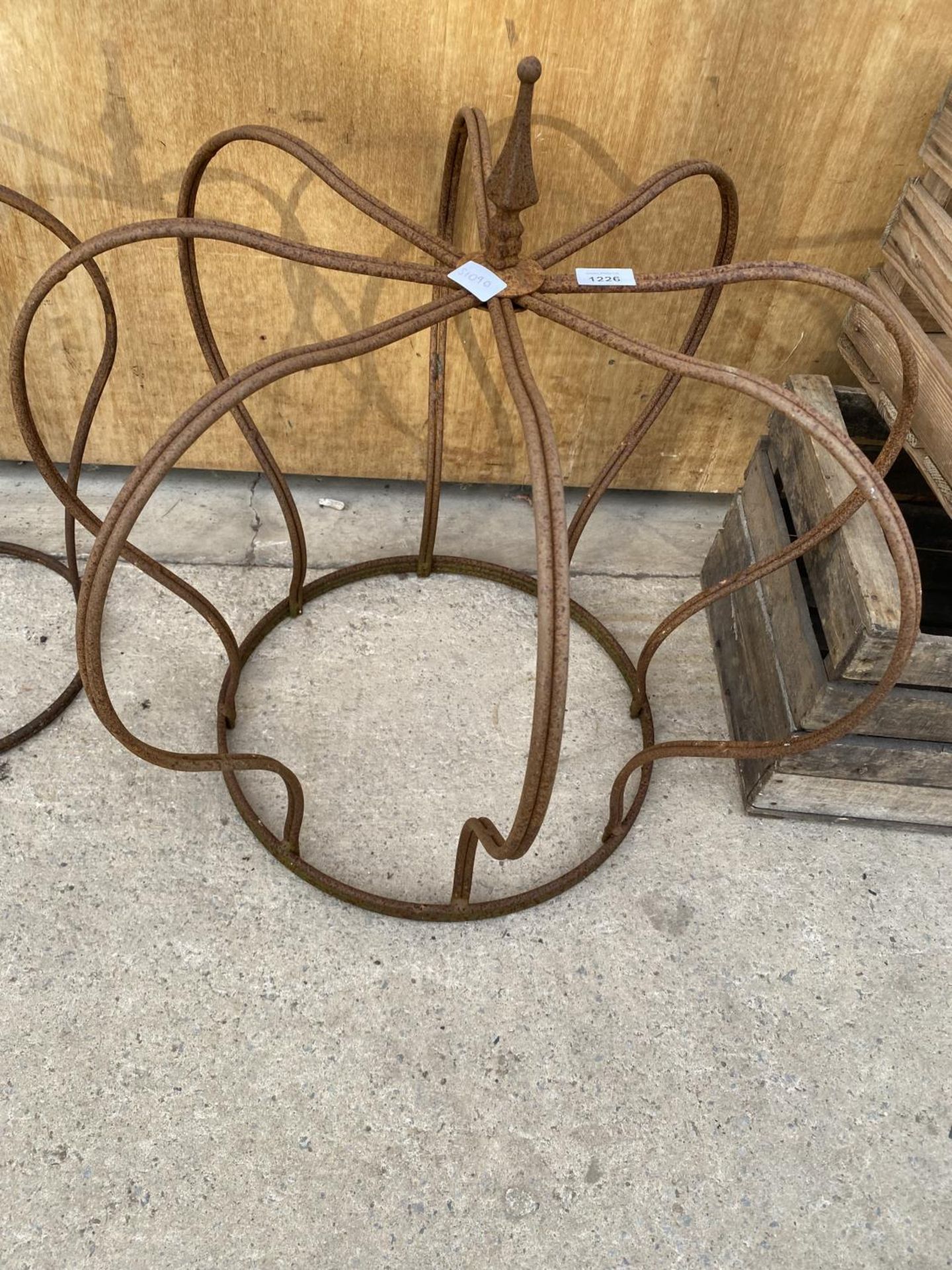 A WROUGHT IRON CROWN SHAPED PLANT CLIMBING FRAME (H:65CM D:67CM)