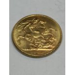 A GEORGE V 1928 GOLD SOVEREIGN