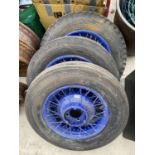 A SET OF THREE VINTAGE WHEELS WITH GOODYEAR TYRES