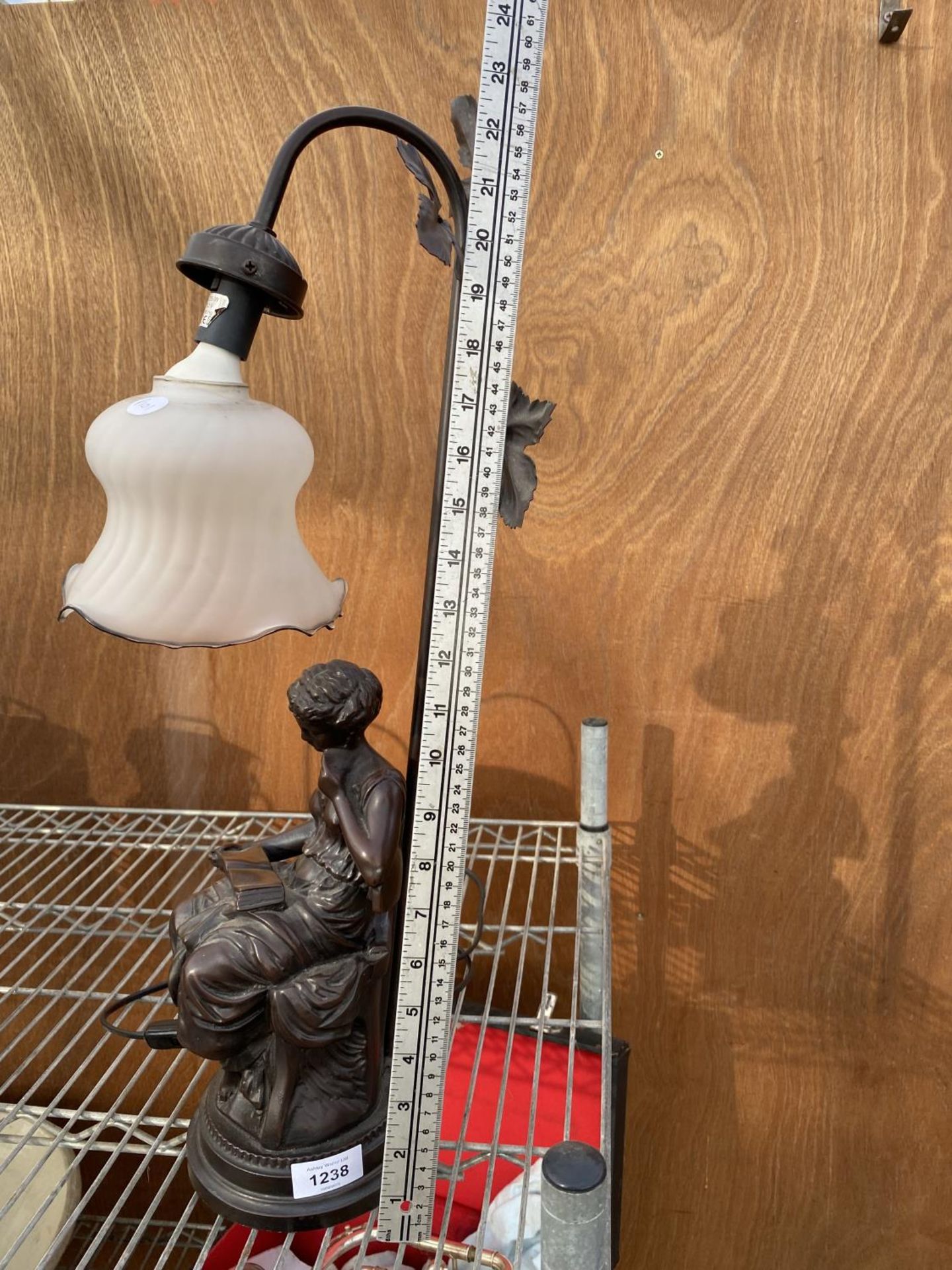 A METAL TABLE LAMP IN THE FORM OF A LADY READING A BOOK WITH A WHITE GLASS SHADE - Image 3 of 3