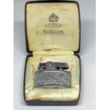 A RONSON CIGARETTE LIGHTER AND CASE