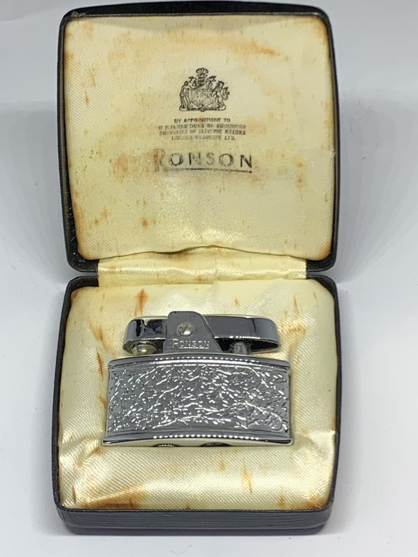 A RONSON CIGARETTE LIGHTER AND CASE