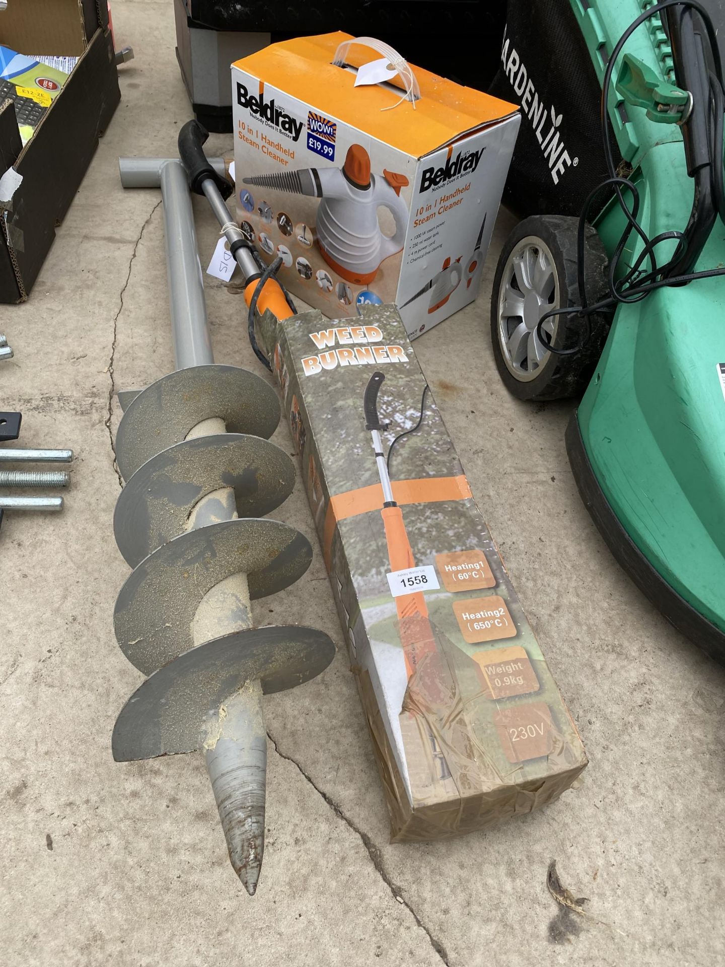 AN ASSORTMENT OF TOOLS TO INCLUDE A WEED BURNER AND A POST HOLE BORER ETC