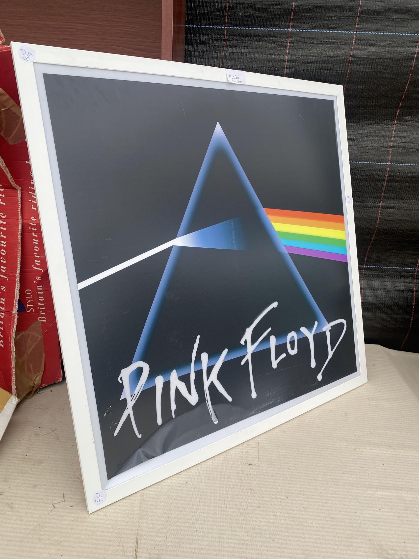 AN ILLUMINATED PINK FLOYD SIGN LACKING ADAPTER AND PLUG