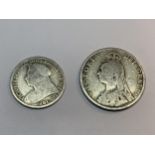 A VICTORIAN SILVER FLORIN AND A SHILLING