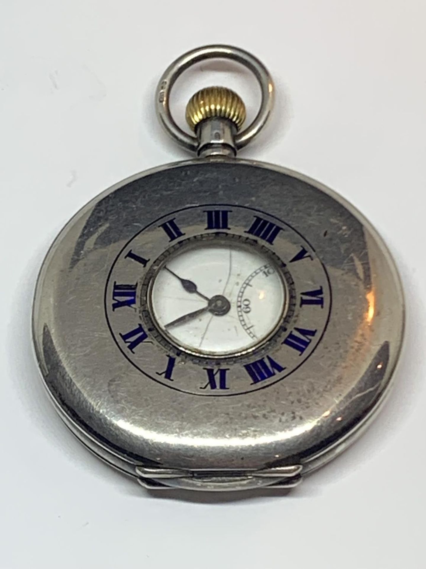 A CONTINENTAL SILVER HALF HUNTER POCKET WATCH