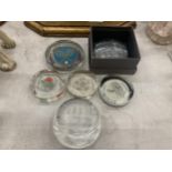 A QUANTITY OF GLASS PAPERWEIGHTS WITH SPORTING THEMES