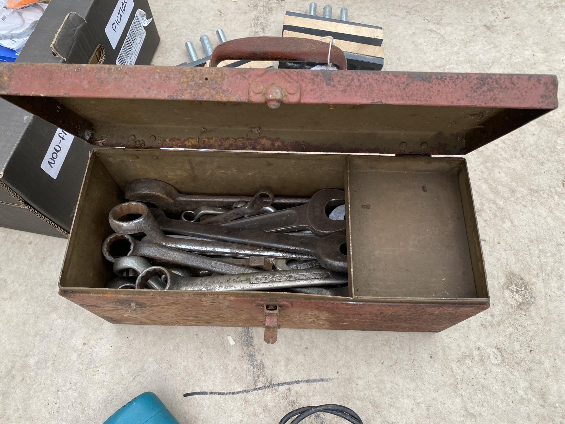 A METAL TOOL BOX CONTAINING AN ASSORTMENT OF SPANNERS