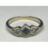 A 14 CARAT GOLD RING WITH A DECO STYLE CENTRE SAPPHIRE AND A DIAMOND EACH SIDE SIZE M GROSS WEIGHT