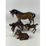 A MIXED LOT OF THREE BESWICK HORSES AND A FURTHER GERMAN EXAMPLE