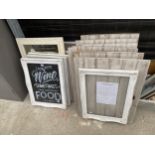 AN ASSORTMENT OF FRAMED PRINTS AND MIRRORS AND NOTICE BOARD FRAMES