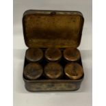 A VINTAGE 1940'S TIN METAL SPICE CHEST WITH SIX INNER LIDDED SPICE CONTAINERS