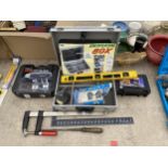 AN ASSORTMENT OF TOOLS TO INCLUDE A SASH CLAMP, SPIRIT LEVEL AND HOT AIR GUN ETC