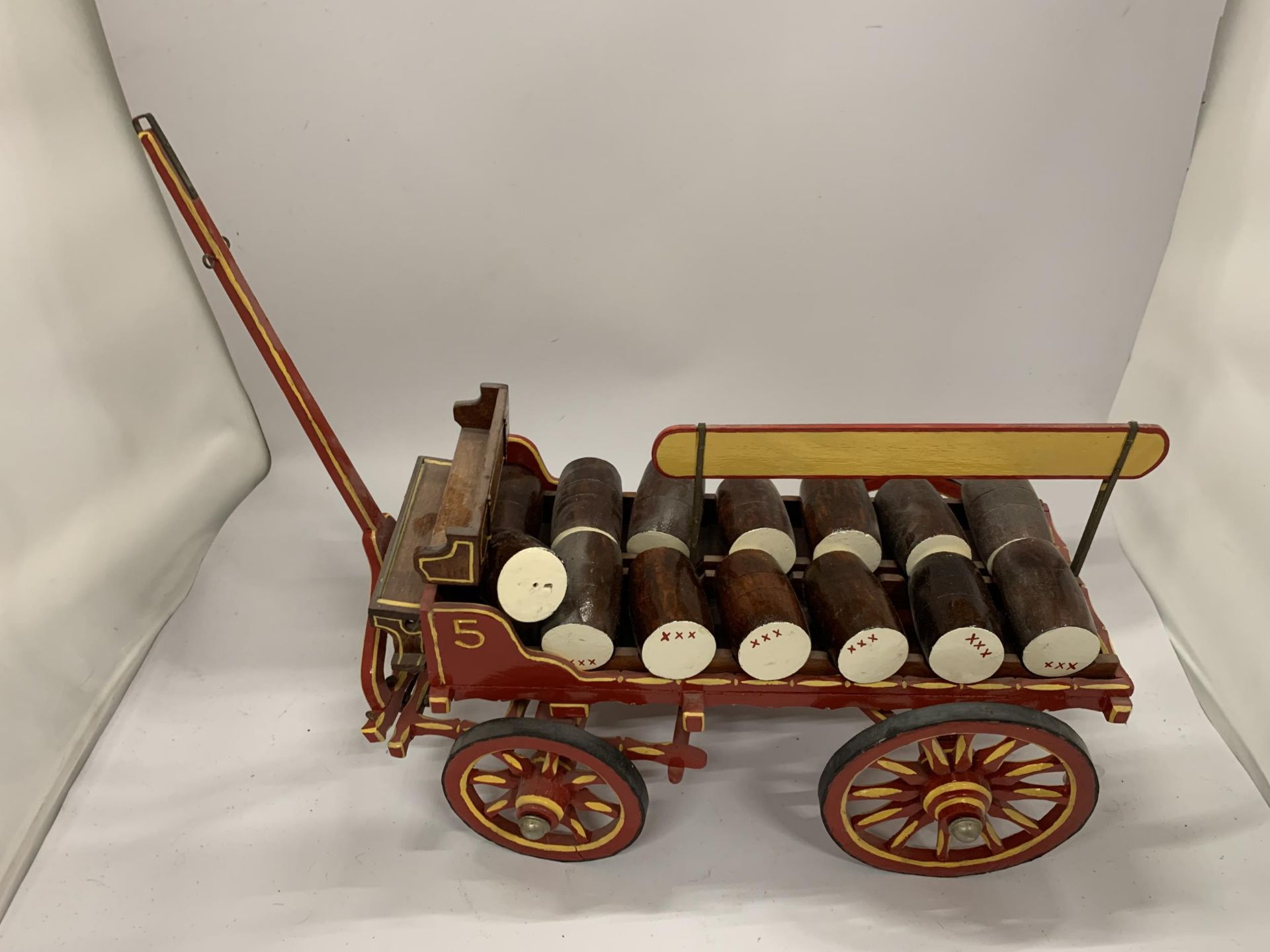 A VINTAGE PAINTED WOODEN ROMANY BARREL CART, LENGTH 65CM