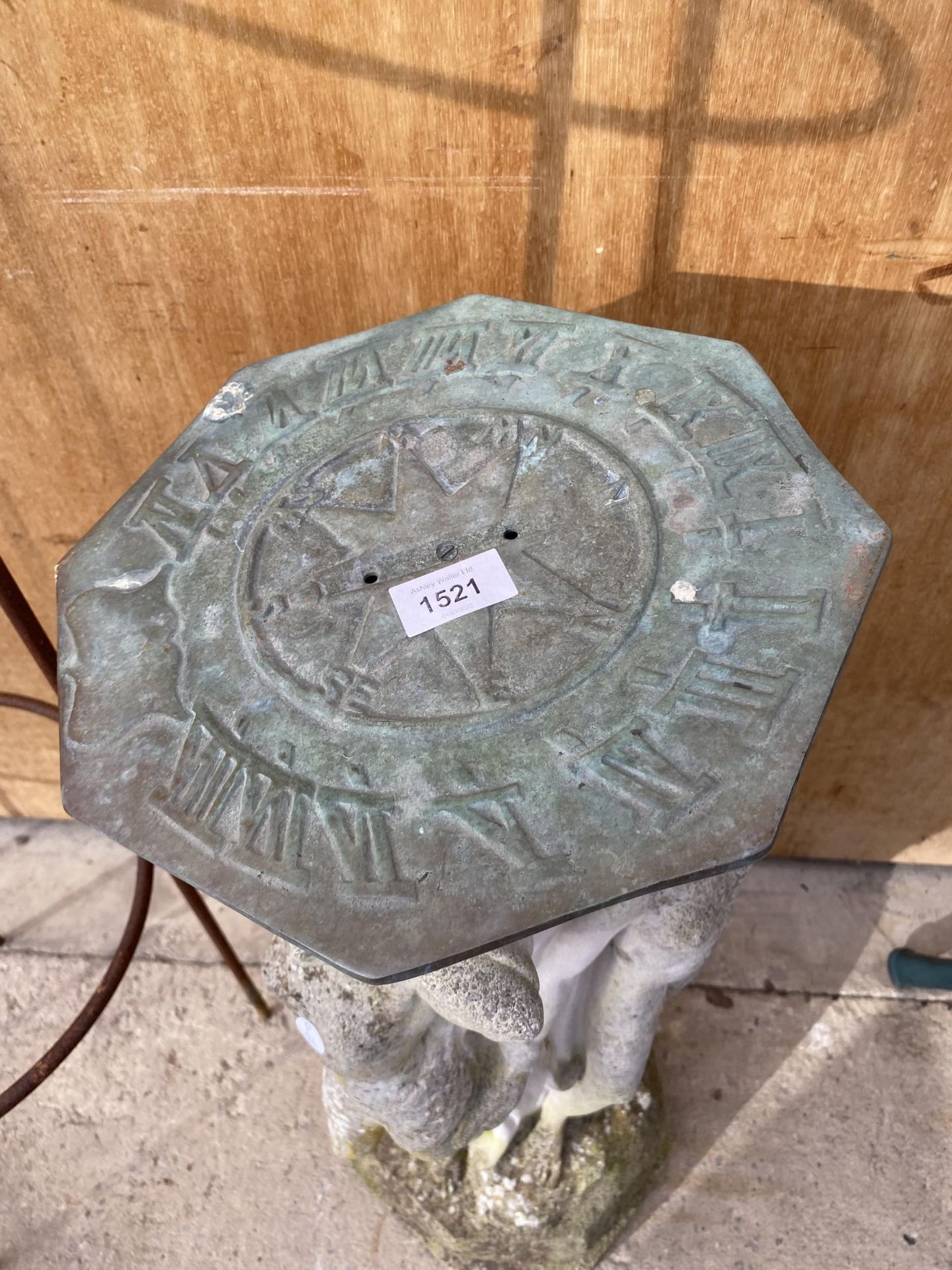 A RECONSTITUTED STONE CHERUB SUNDIAL WITH BRASS TOP (MISSING THE POINT) - Image 3 of 4