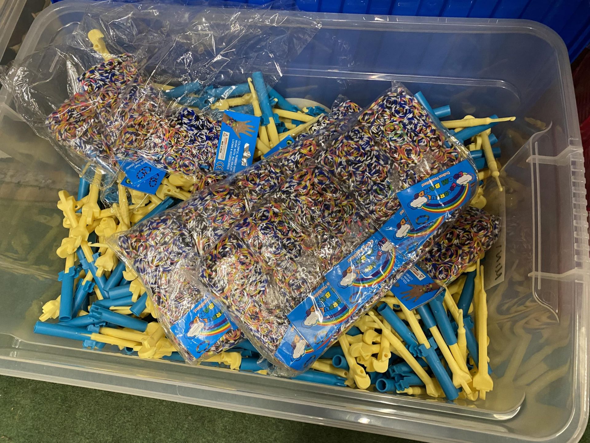 A BOX OF LOOM BANDS AND ACCESSORIES