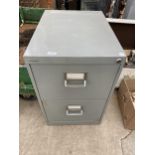 A TWO DRAWER METAL FILING CABINET