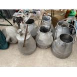 AN ASSORTMENT OF GALVANISED AND STAINLESS STEEL MILKING BUCKETS