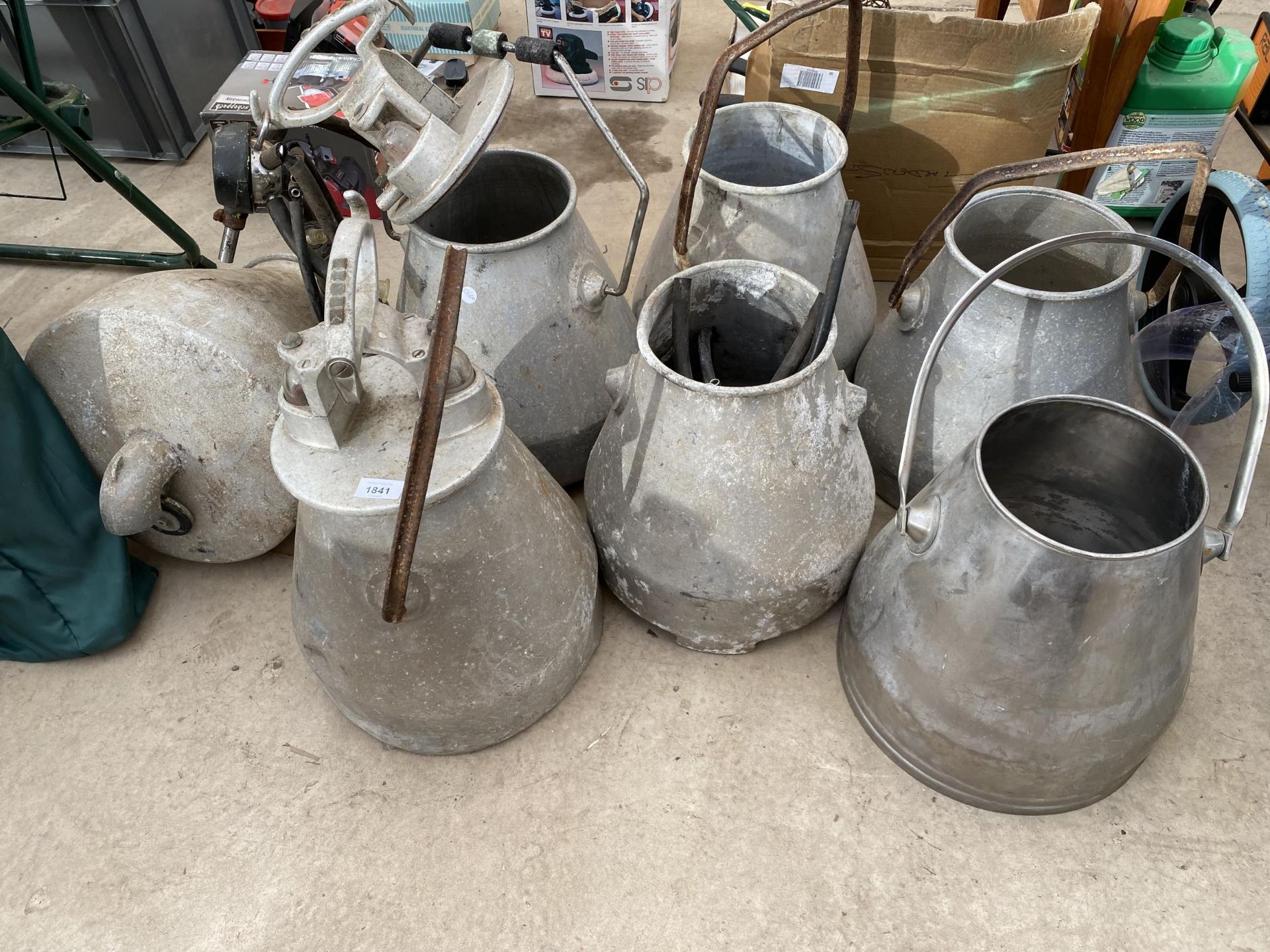 AN ASSORTMENT OF GALVANISED AND STAINLESS STEEL MILKING BUCKETS