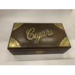 A VINTAGE LEATHER AND BRASS CIGAR BOX