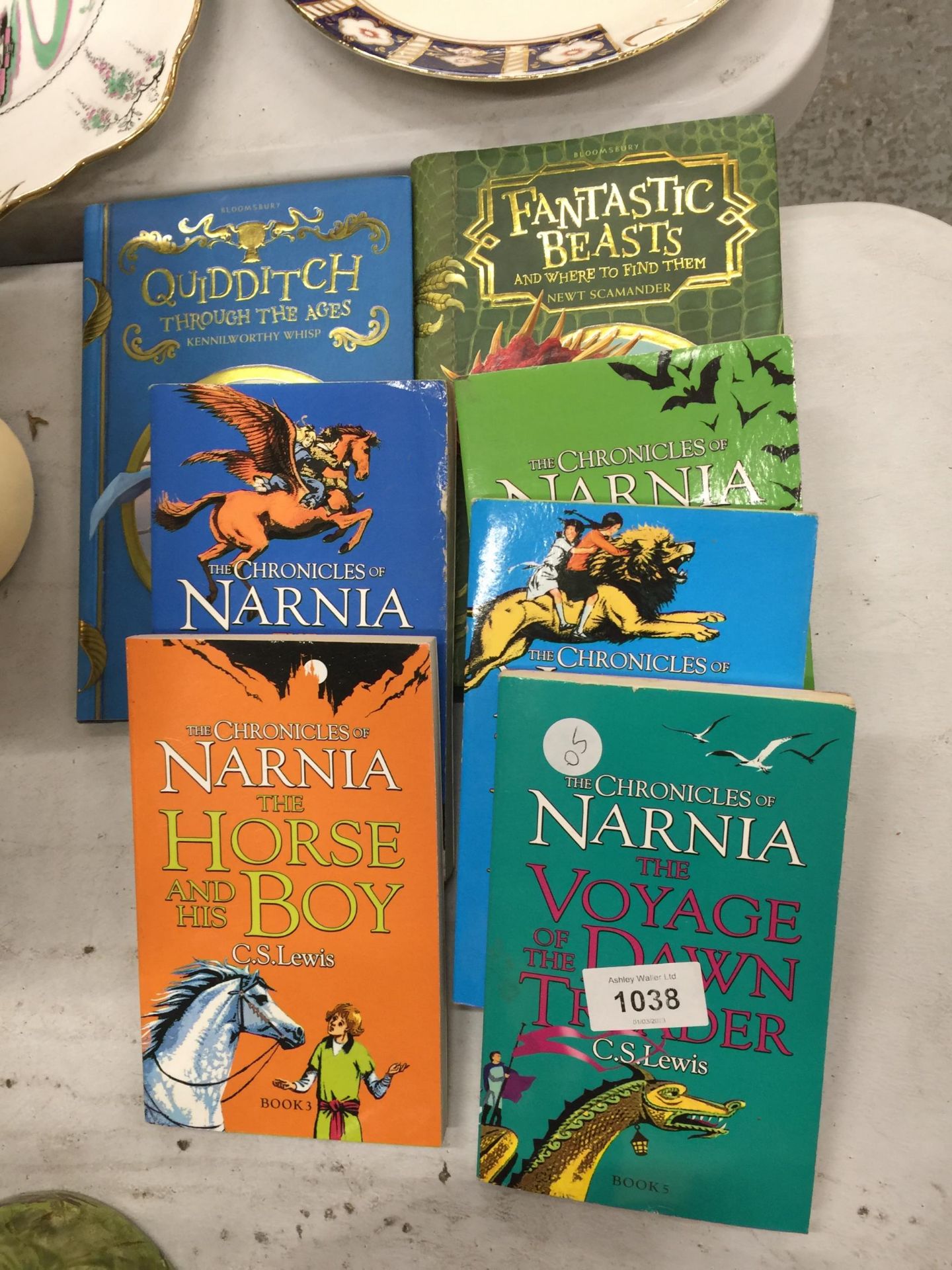 FIVE C. S. LEWIS CHRONICLES OF NARNIA PAPERBACKS PLUS TWO J. K. ROWLING BOOKS