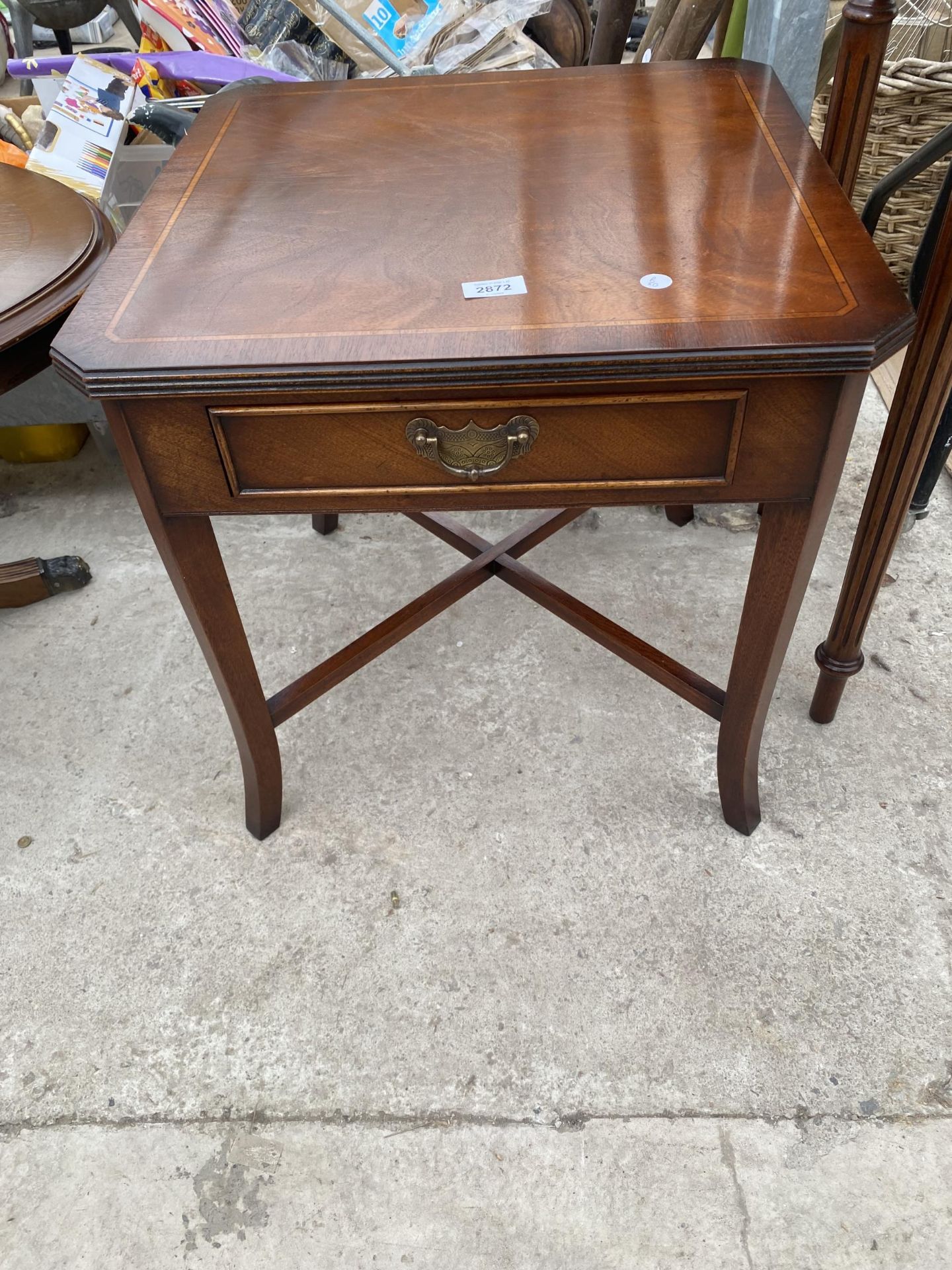 A MAHOGANY AND INLAID LAMP TABLE WITH SINGLE DRAWER