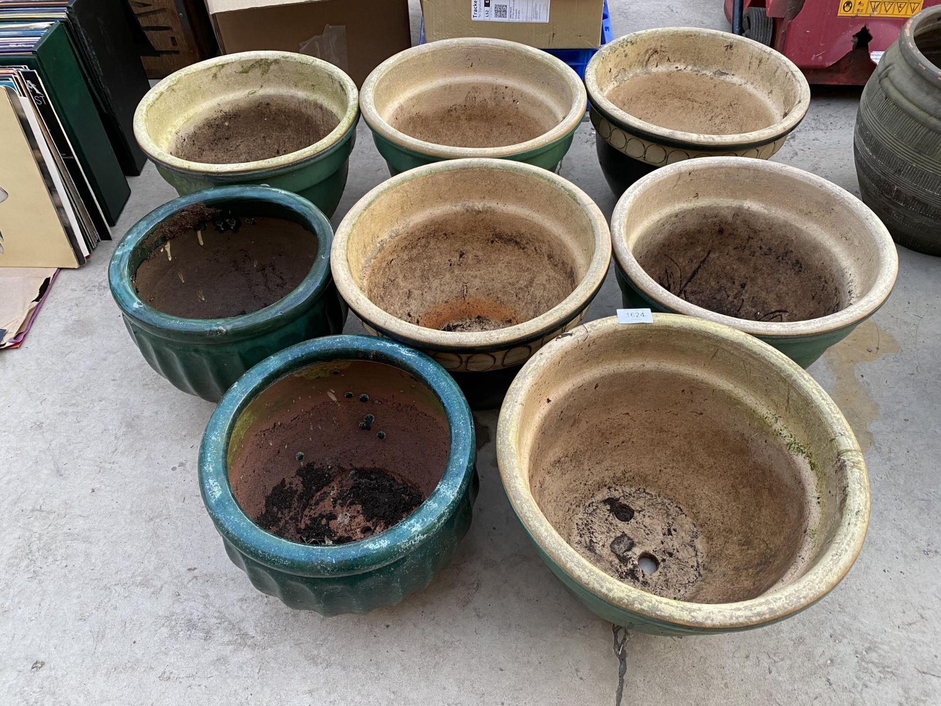 EIGHT GREEN GLAZED PLANTERS