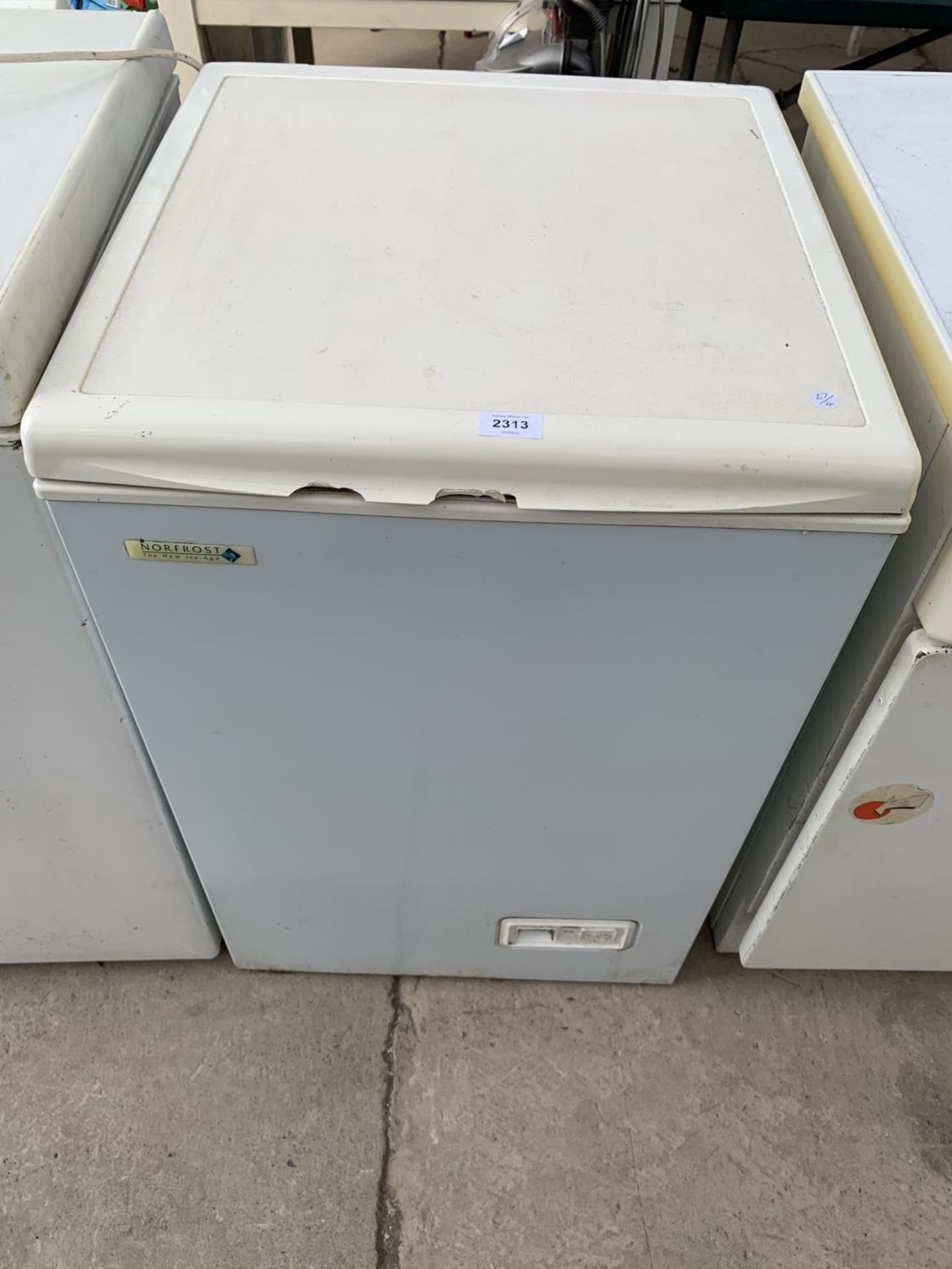 A SMALL WHITE NORFROST CHEST FREEZER