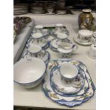 A PHOENIX CHINA TEASET TO INCLUDE SIX TRIOS, A SUGAR BOWL, MI;K JUG AND CAKE PLATE