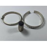 THREE HALLMARKED SILVER ITEMS TO INCLUDE TWO BANGLES AND A LIDDED PILL BOX
