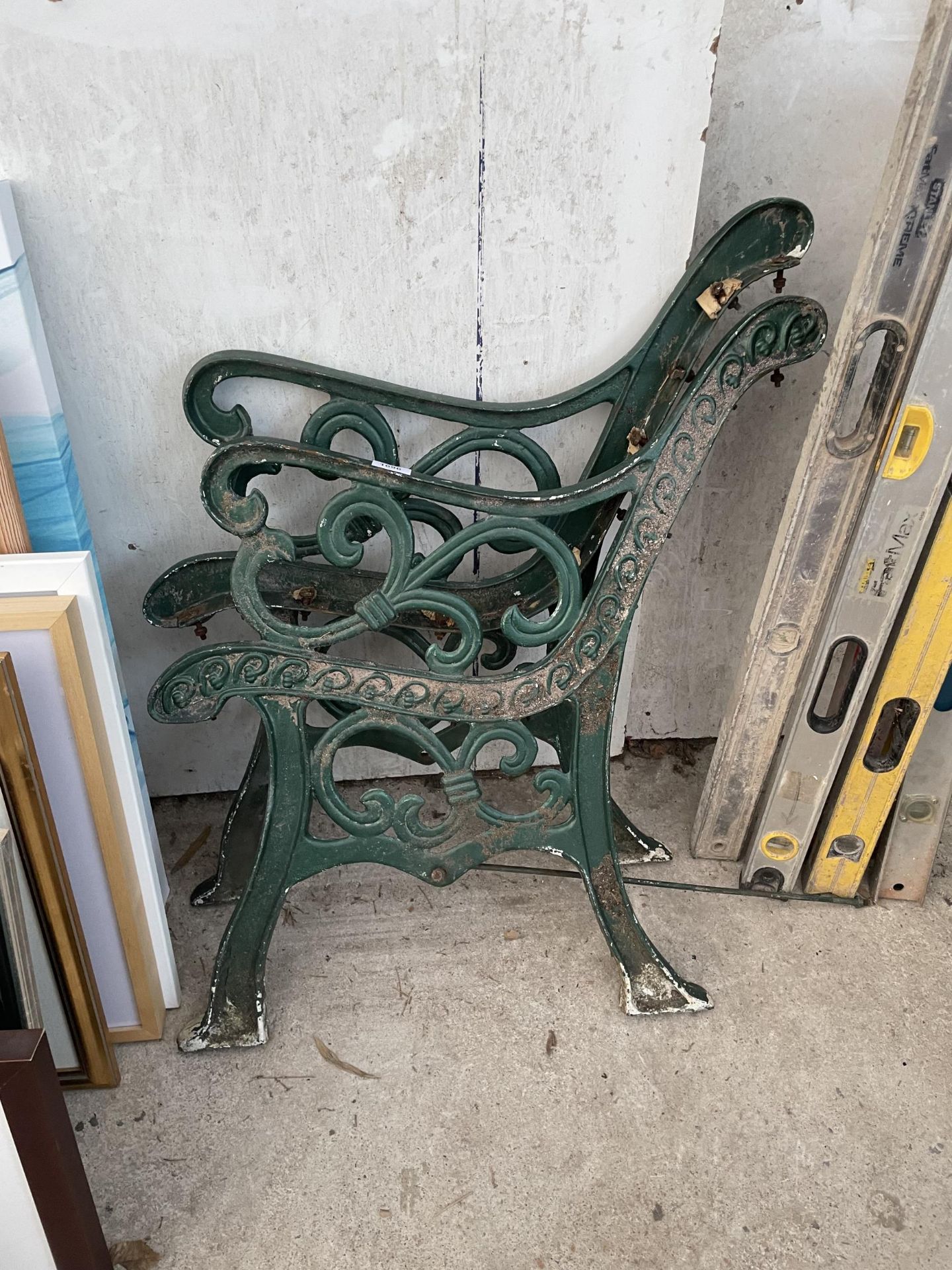 A PAIR OF CAST IRON BENCH ENDS