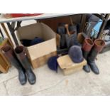 A LARGE ASSORTMENT OF VINTAGE HORSE RIDING BOOTS AND HATS