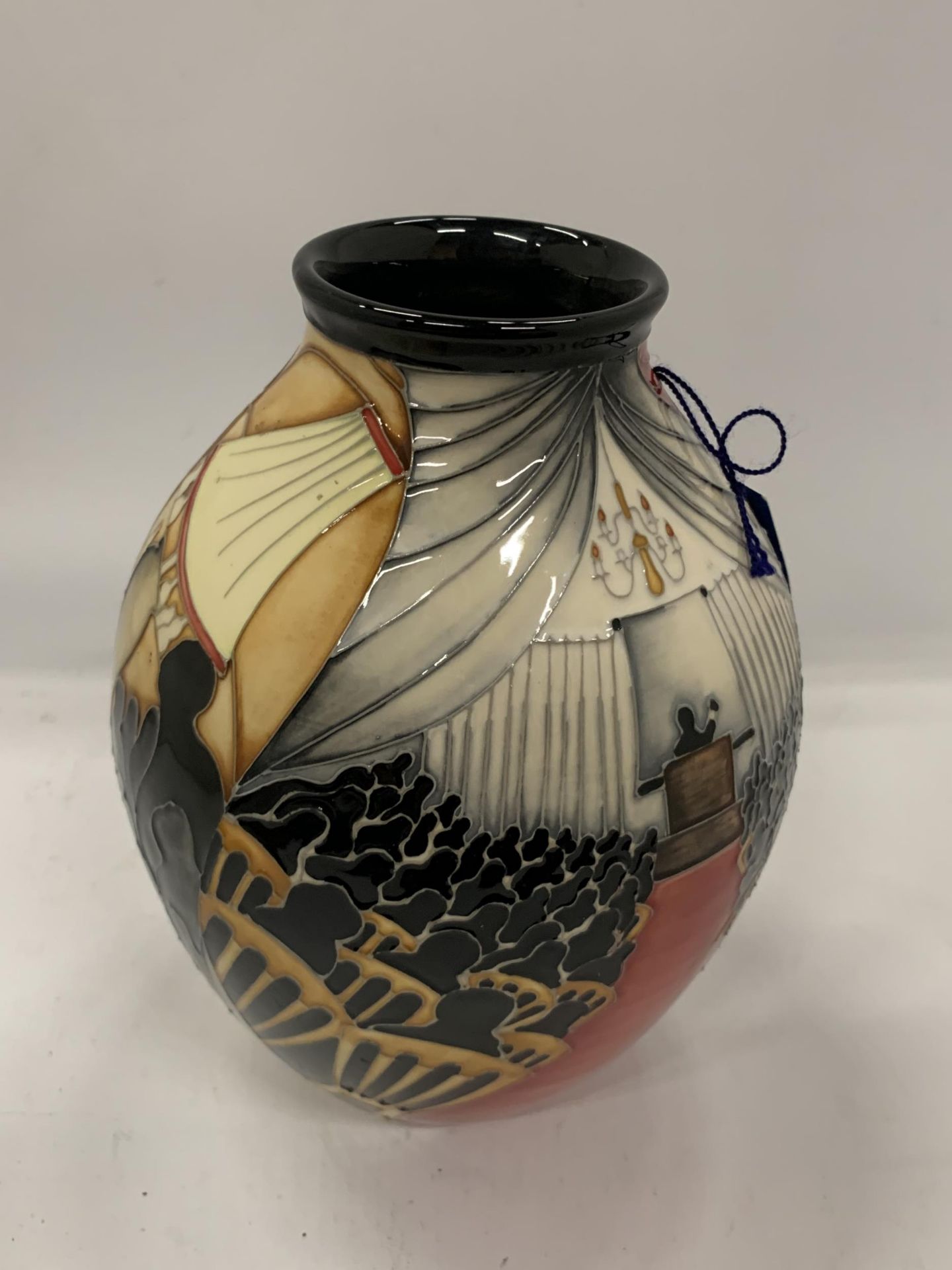 A LIMITED EDITION MOORCROFT 'OPEN DAY' PATTERN VASE, NO.14/15, HEIGHT 21CM