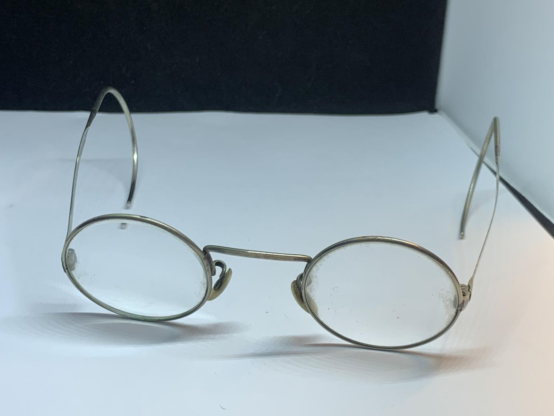 A PAIR OF ALGHA SAVILLE ROW LONDON SPECTACLES