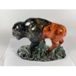 A HANDPAINTED AND SIGNED IN GOLD ANITA HARRIS BISON FIGURE