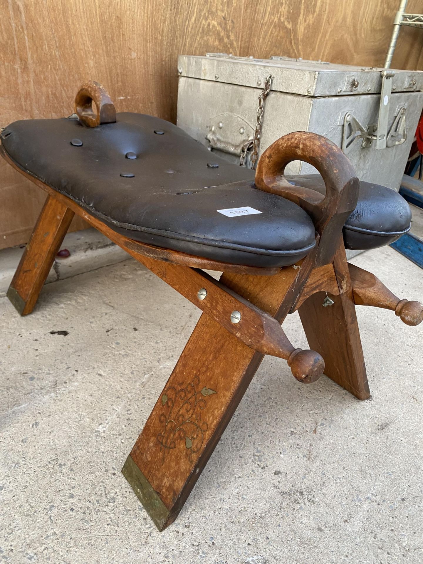 A WOODEN AND LEATHER TOPPED SADDLE STYLE STOOL - Image 2 of 2