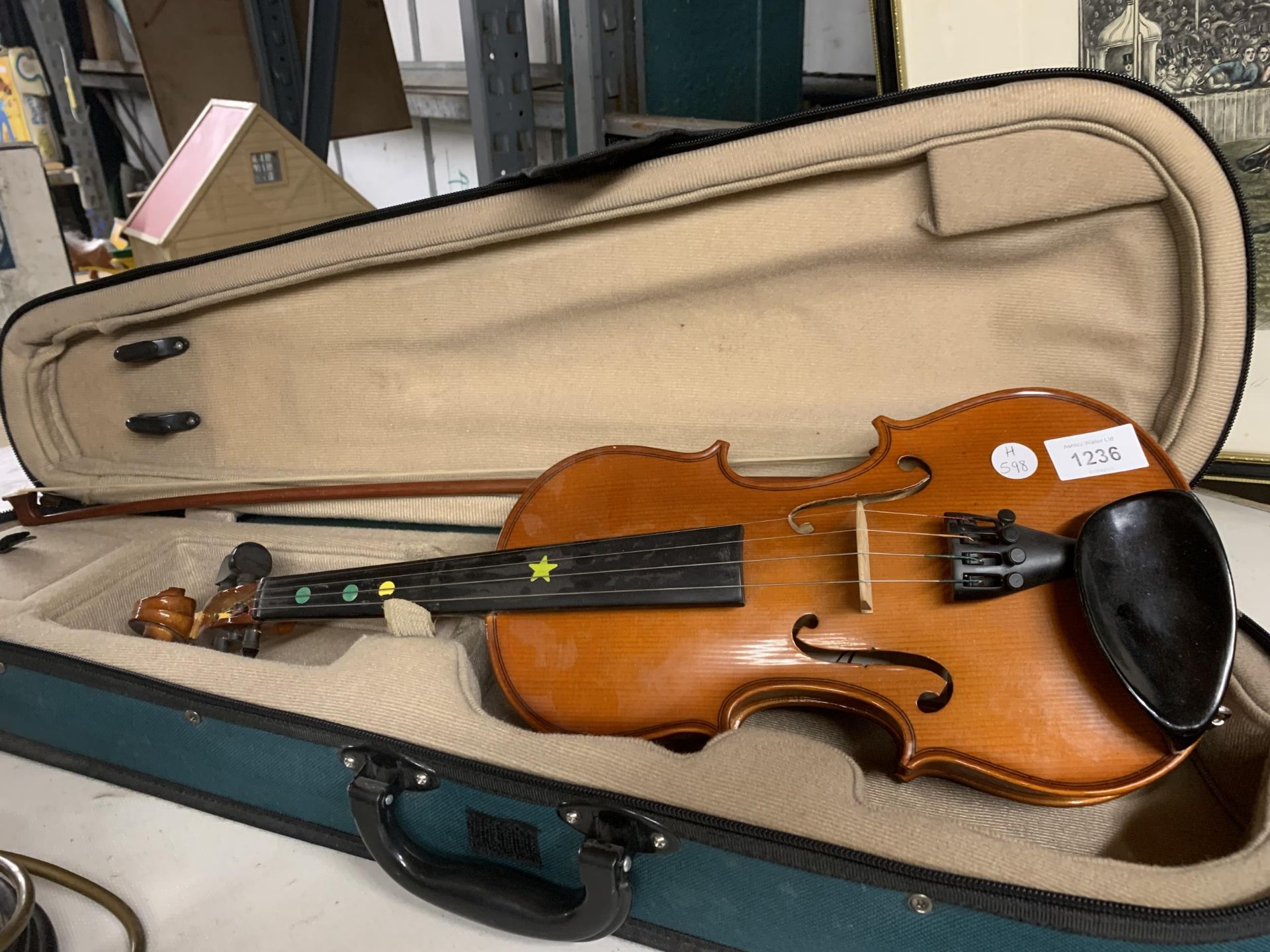 A VIOLIN AND BOW IN A FITTED CASE