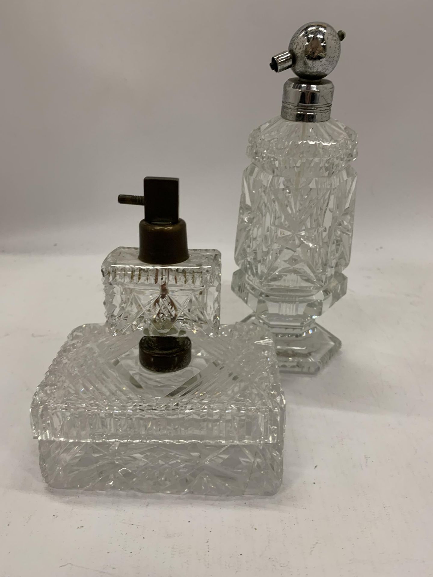 TWO CUT GLASS PERFUME BOTTLES