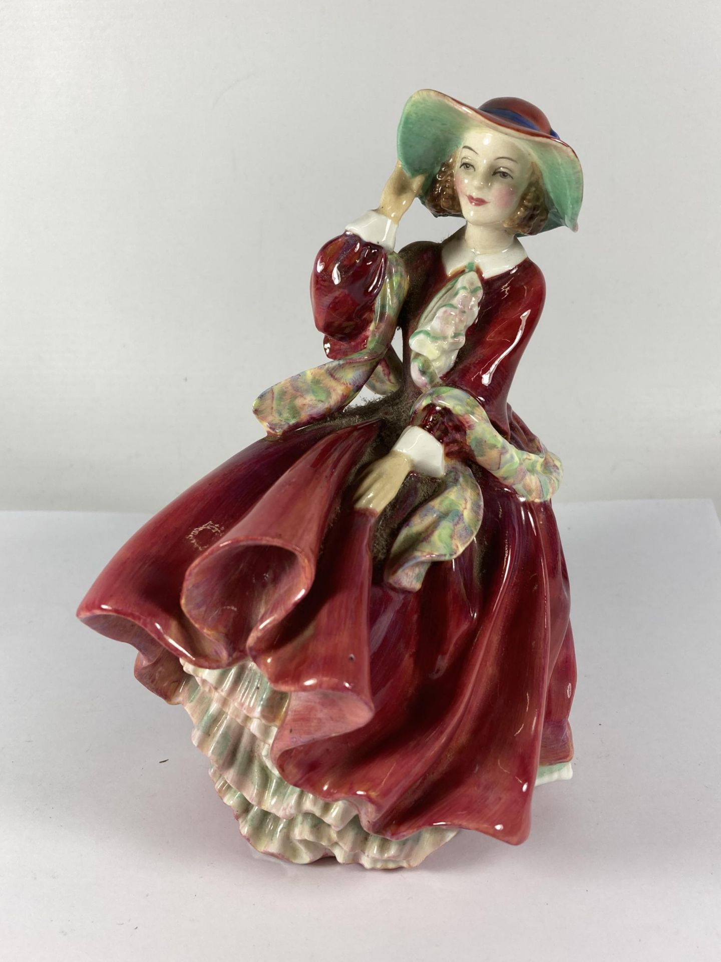 A ROYAL DOULTON FIGURE TOP O THE HILL