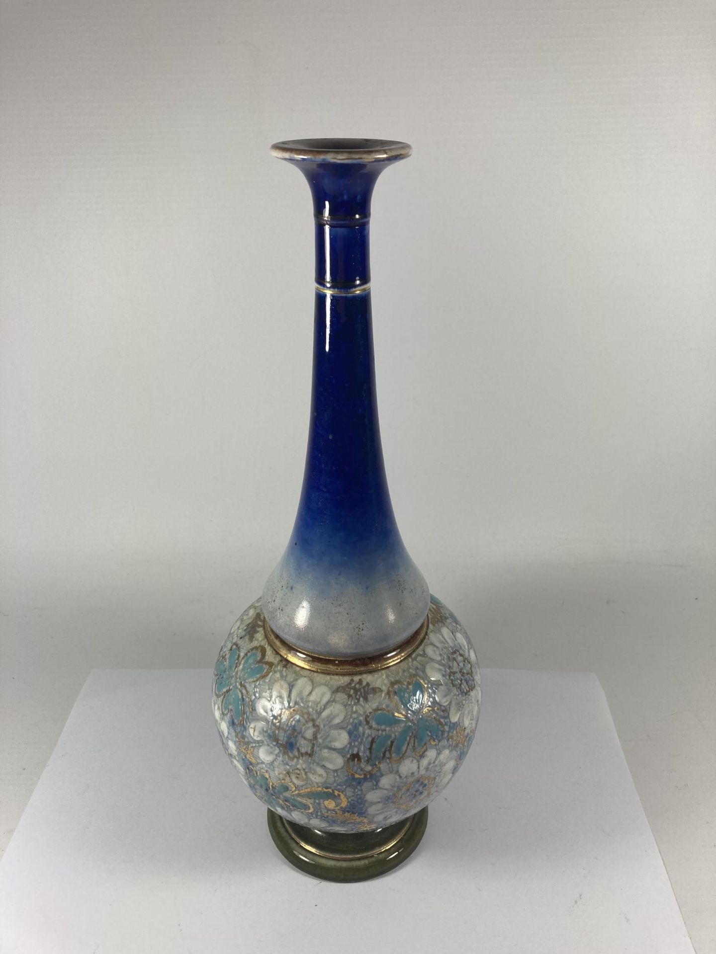 A DOULTON STONEWARE VASE