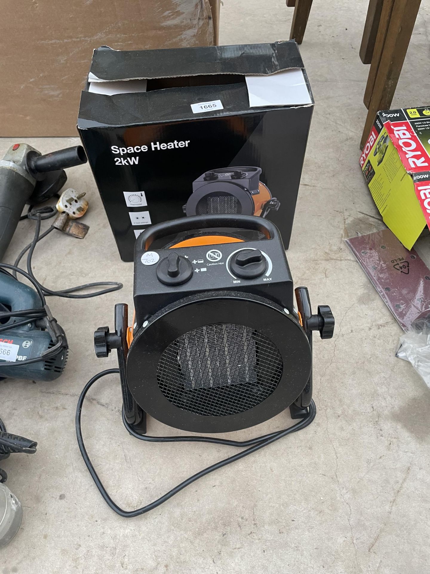 A NEW AND BOXED 2KX ELECTRIC SPACE HEATER