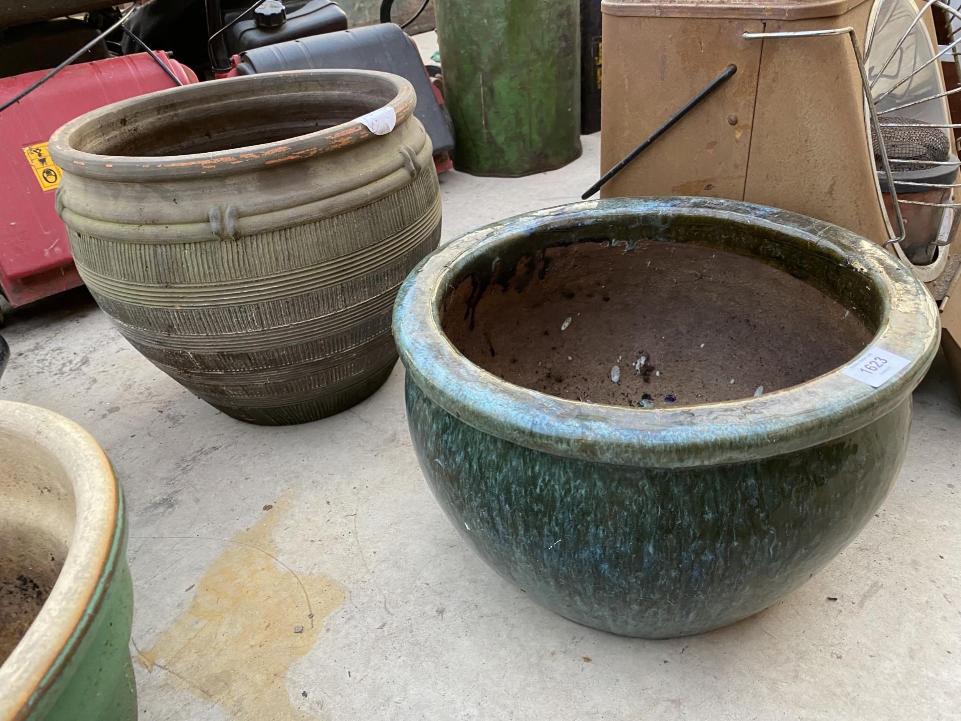 TWO GREEN GLAZED TERRACOTTA PLANTERS