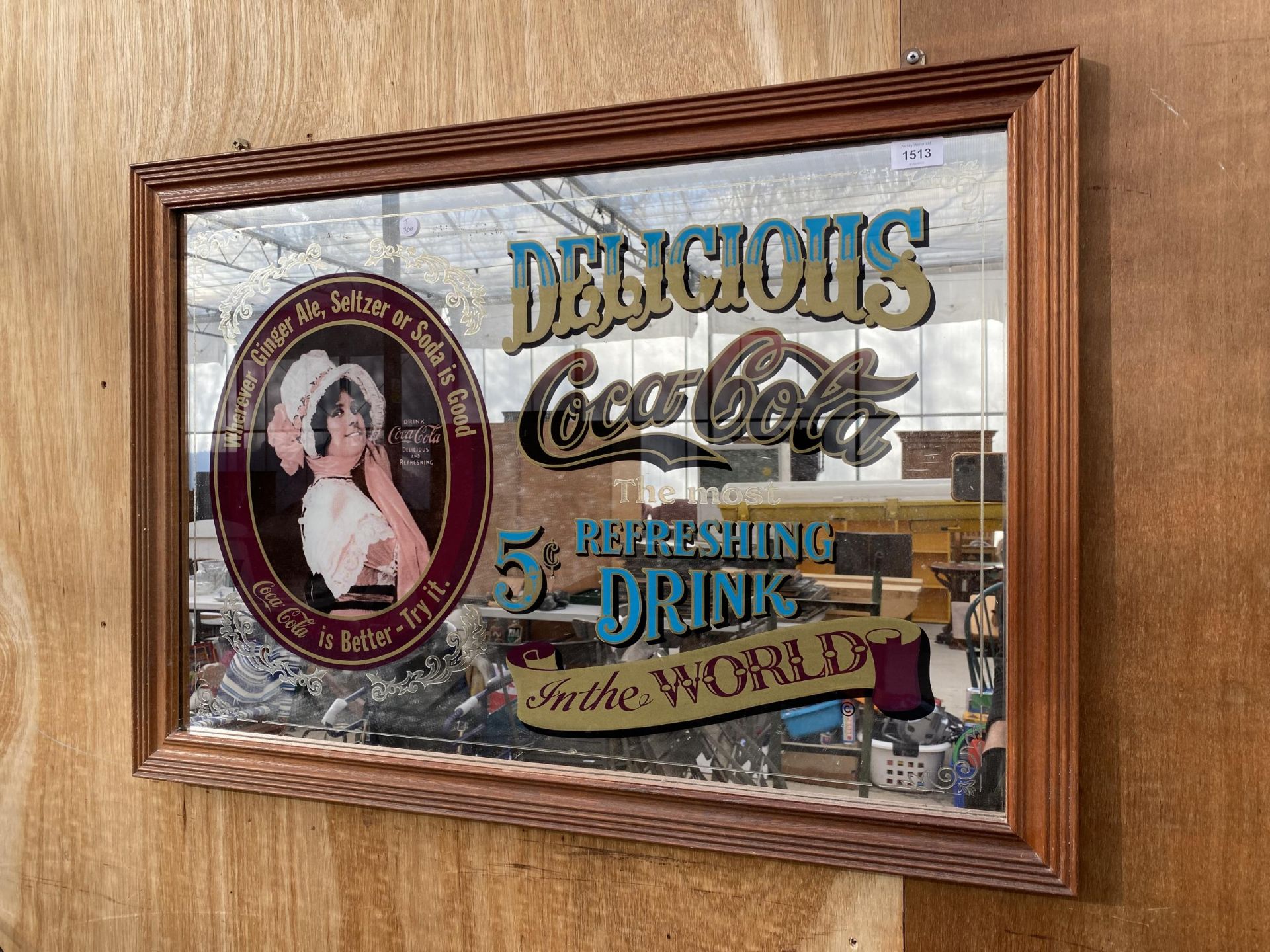 A WOODEN FRAMED 'COCA-COLA' PUB ADVERTISING MIRROR