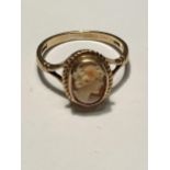 A 9 CARAT GOLD RING WITH A CAMEO SIZE P/Q