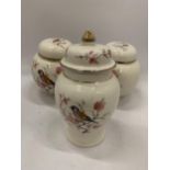 TWO ARTHUR WOOD GINGER JARS AND A TEMPLE JAR WITH BIRDS AND BLOSSOM DESIGN