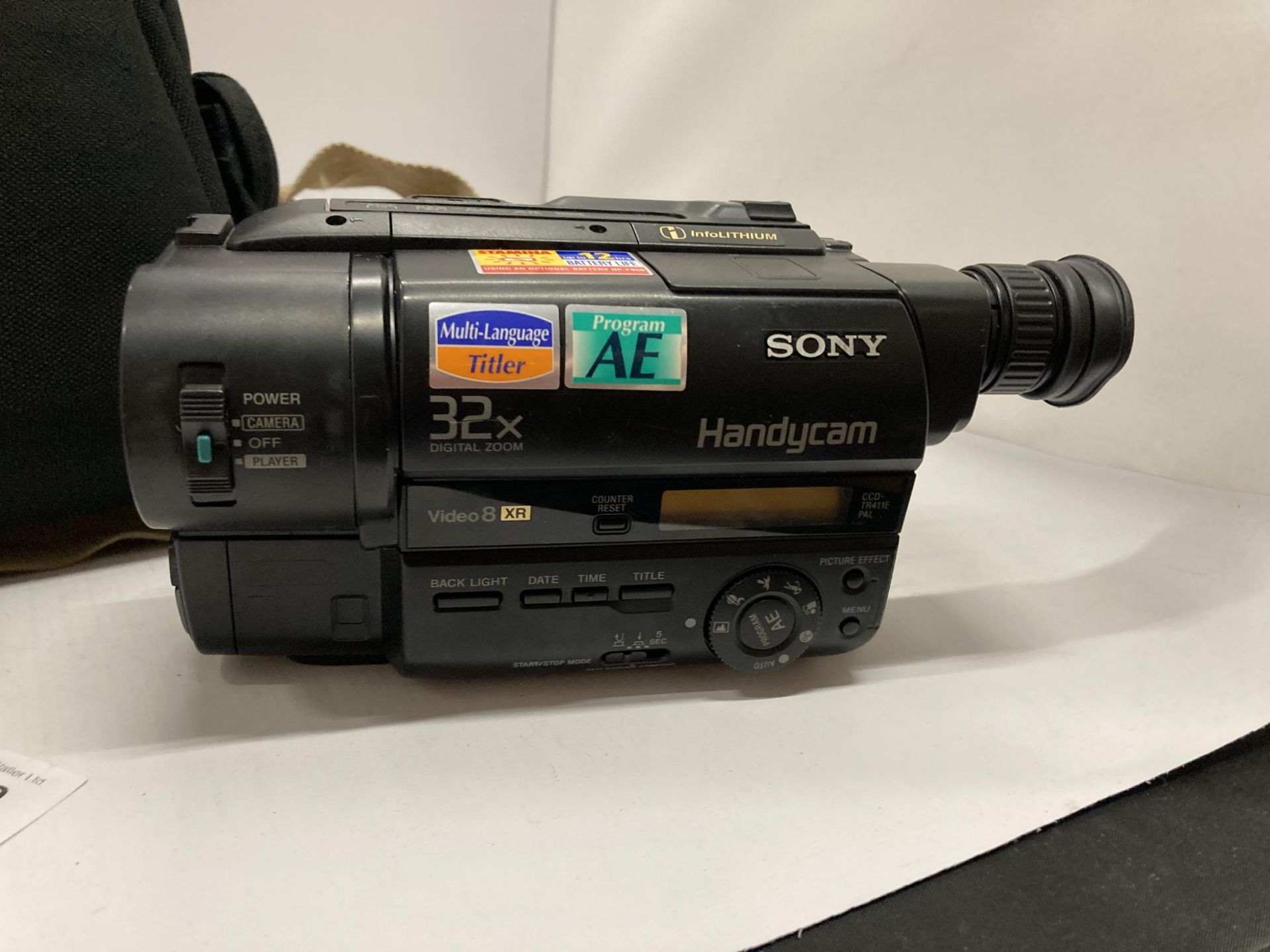 A SONY VIDEO CAMERA RECORDER WITH ACCESSORIES IN A VANGUARD BAG