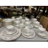 A LARGE QUANTITY OF TEA WARE TO INCLUDE TUSCAN TRIOS, SUGAR AND MILK, ROYAL STANDARD AND WINDSOR