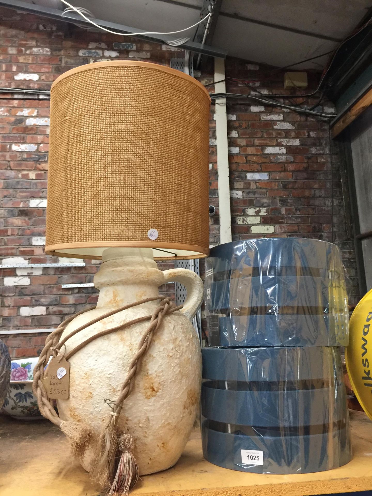 A LARGE STONEWARE TABLE LAMP PLUS TWO LAMP SHADES